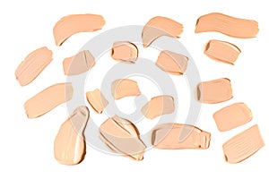 Liquid foundation swatch isolated on white background. Close Up of makeup cream sample