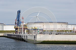 Liquid gas transshipment terminal in harbor Rotterdam, biggest seaport Europe photo