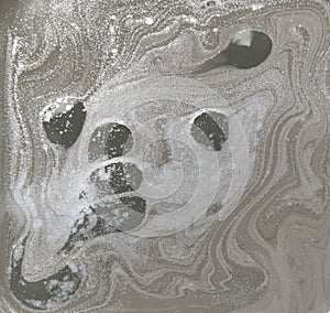 Liquid gold marbled pattern. Pale beige background