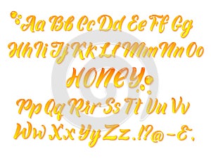 Liquid honeyed latin alphabet with gold splashes. Hand writing yellow letters vector set