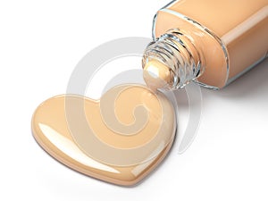 Liquid makeup foundation cream in form of the heart symbol and g