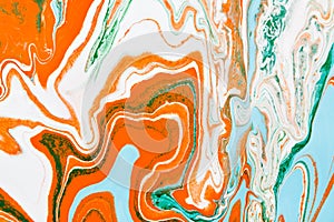 Liquid marbling acrylic paint background. Fluid painting abstract