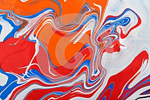 Liquid marbling acrylic paint background. Fluid painting abstract texture photo