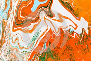 Liquid marbling acrylic paint background. Fluid painting abstract