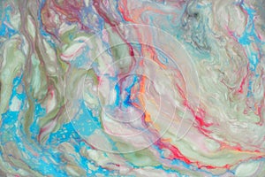 Liquid marbling paint background. Fluid painting abstract texture. Mix of acrylic vibrant colors.