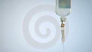 Liquid medicine dropping to intravenous line, IV therapy for urgent life saving