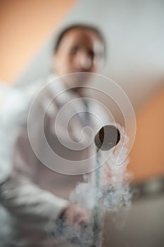Liquid nitrogen technician fills container