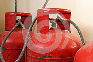 liquid petroleum gas (LPG) cylinders stored in a chamber