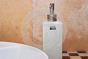 Liquid soap dispenser in bathroom