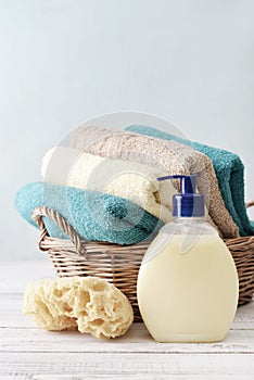 Liquid soap, sponge and towels