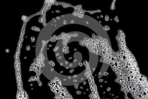 Liquid white foam diffuses abstract bubbles