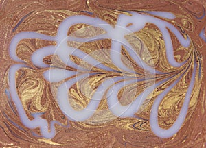 Liquid white and gold marbled pattern. Beige background