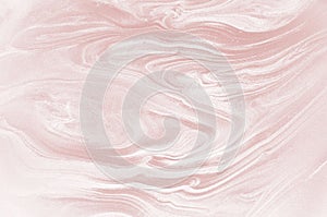 Liquid white and gold marbled pattern. Beige background