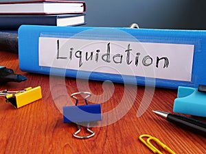 Liquidation is shown on the conceptual business photo