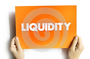 Liquidity - efficiency with which an asset or security can be converted into ready cash without affecting its market price, text photo
