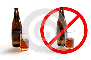 Liquor bottles and glass of liquor and stop sign on white background