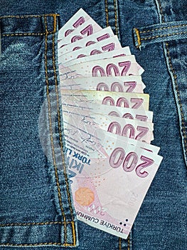 Liras in blue jeans pocket. Turkey money.