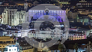 Lisbon aerial view of city centre with illuminated building at autumn night timelapse, Portugal