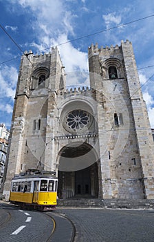 Lisbon cathedral and a tramway photo