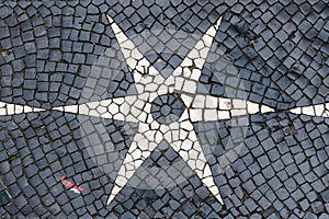 Lisbon cobblestone pavement in black white star designs