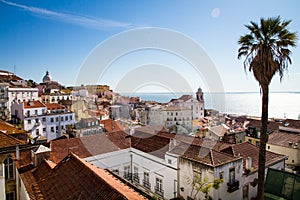 Lisbon, Portugal: Aerial View of the Old Alfama Quarter on the Hill with Blue Sky