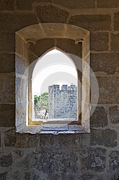 Lisbon, Portugal. Gothic window on the inside of a tower of the Castelo de Sao Jorge