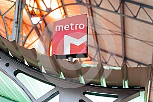 Lisbon, Portugal - January 18, 2020: Metro subway sign inside the Rossio Train Station, to connect commuter trains to the Lisbon