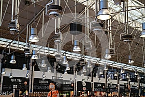 High ceilings and lights at Time Out Market Lisbon