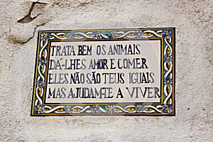 Lisbon, Portugal: popular block about the animals in tiles in a wall in Mouraria quarter photo