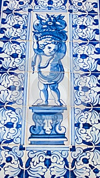 Lisbon, Portugal: street tiles with baroque motifs in Alfama quarter