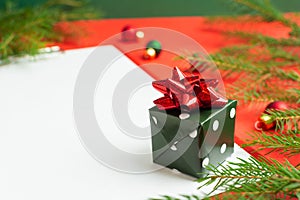 A list of Christmas wishes next to several small gifts