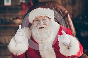 Listen i want tell you newyear christmas advent story. Portrait of positive jolly holly santa claus sit armchair in