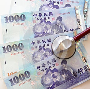 Listen to Taiwan Money (TWD Dollars) by stethoscop photo