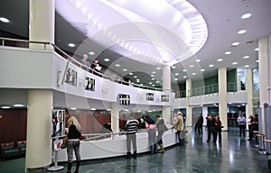 Listeners in foyer of concert hall