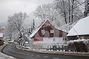 Listopad street in winter, Swieradow Zdroj resort, northern slope of Jizera Mountains, Poland