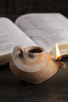 Lit Ancient Oil Lamp with an Open Bible Thy Word is a Lamp Unto My Feet