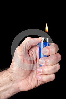 Lit butane lighter