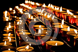 Lit candle offerings