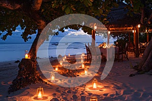Lit Candles on Sandy Beach, A candlelit pathway leading to a beautifully decorated beachside dinner setting, AI Generated