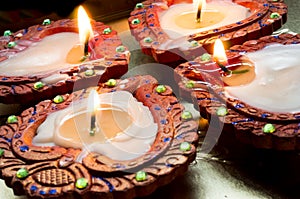 Lit earthenware diyas for Diwali