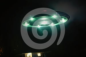 Lit ufo hovering above house at night, created using generative ai technology