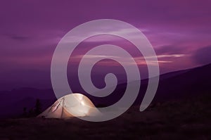 Lit up tent at Sunset