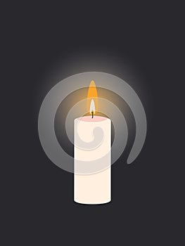 Lit wax candle with fire flame isolated on black vertical background. The concept of a minute of silence and respect