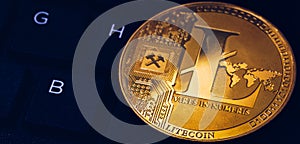 Litecoin cryptocurrency crypto currency. Silver Litecoin coin with gold Litecoin symbol. Litecoin ltc cryptocurrency