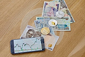 Litecoin, ethereum, bitcoin, banknotes and photo