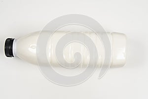 Liter plastic milk pot on white background