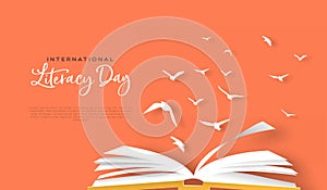 Literacy day papercut card open book birds flying