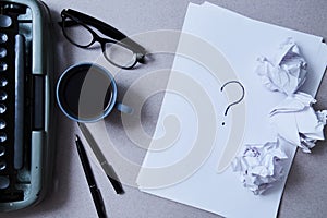 Literature, author and writer, writing and journalism concept: typewriter, cup of coffee and glasses and a paper