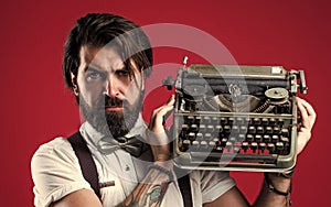 literature and poetry. old technology in modern life. old fashioned bearded hipster. trendy man in bow tie use retro