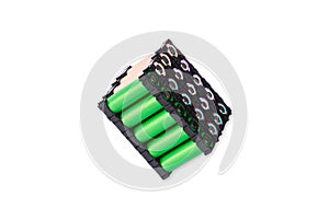 Lithium battery pack in black plastic holder on white background